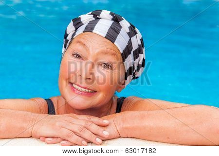 female senior workout smiling camera