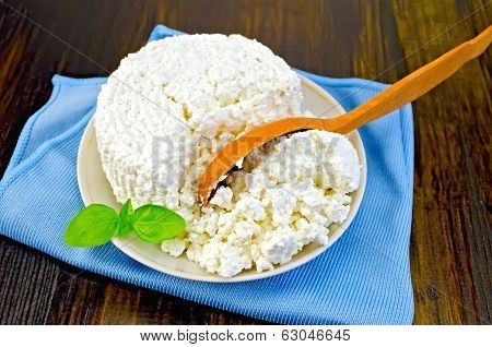 Curd With A Wooden Spoon On Board