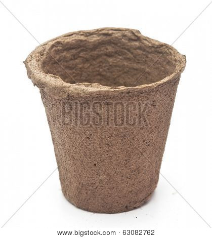 pile peat pots for growing seedlings, isolated on white background 