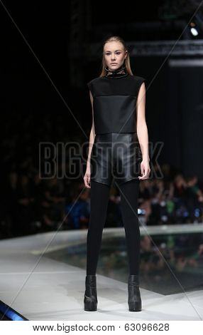 ZAGREB, CROATIA - MARCH 29: Fashion model wearing clothes designed by Silvio Ivkic on the 'Fashion.hr' show on March 29, 2014 in Zagreb, Croatia.