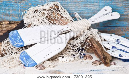 Decoration in Navy style in blue with paddles - maritime