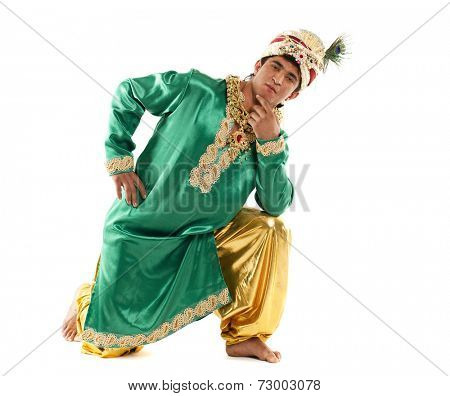 Young indian male in dhoti dress, isolated on white background