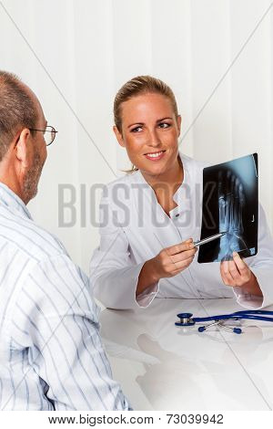 patient and doctor talking on the advice of the doctor's office. orthopedist in the discussion of findings