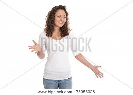 Isolated pretty happy young woman presenting over white background.