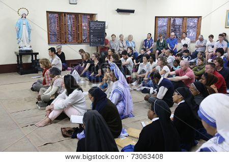 KOLKATA, INDIA - FEBRUARY 15: Sisters of Mother Teresa's Missionaries of Charity and volunteers from around the world at the Mass in the chapel of the Mother House, Kolkata, India at February 15,2014.