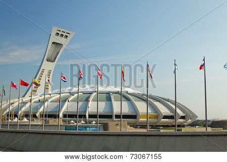 MONTREAL  CANADA - SEPT 05: Olympic stadium with international flags on september 05, 2014 in MONTREAL