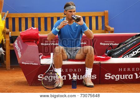 BARCELONA - APRIL, 24: Spanish tennis player Rafa Nadal in action during a match of Barcelona tennis tournament Conde de Godo on April 24, 2014 in Barcelona