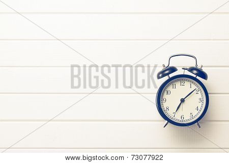top view of analog retro alarm clock