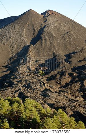small volcanic cone of De Fiore Mount and cooled lava flow (sciara) of the 1974 eruption in Etna National Park, Sicily
