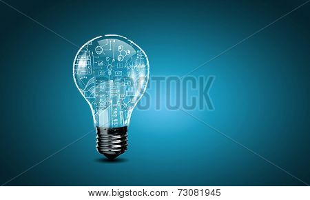 Conceptual image with light bulb and business sketches inside