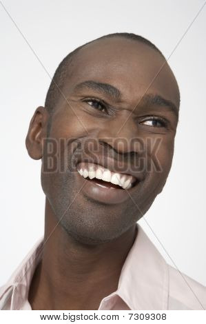 Smiling Man with squinty eyes close-up