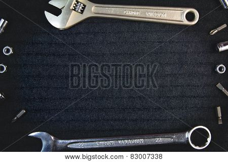 Set of tools on black background