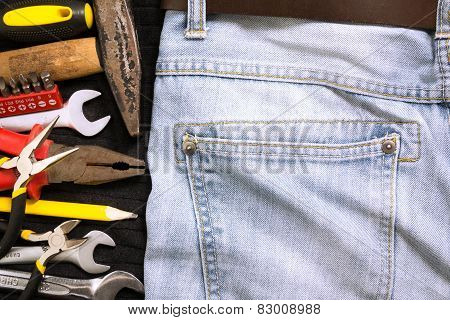 Toolkit in a blue jeans background