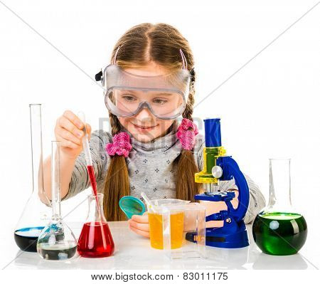 happy little girl with flasks for chemistry isolated on a white background