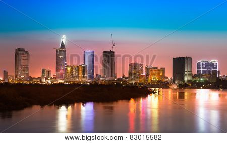 Saigon skyline with river after sunset, Vietnam