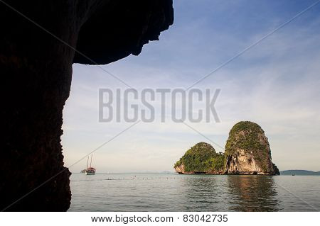 Cliffy Island In Azure Sea Water