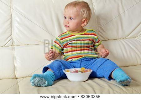 Boy Eating Sweets