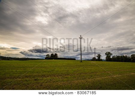 Energy Cable In The Fields Of Italy