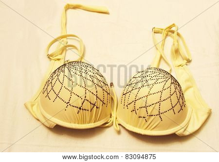 Light Yellow Bra Isolated On The White Background