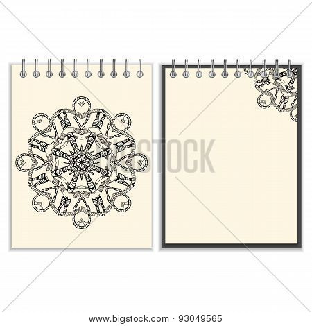 White cover notebook with handmade black pattern