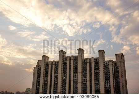 Multistoried Building In Gurgaon With Cloudy Colorful Sky