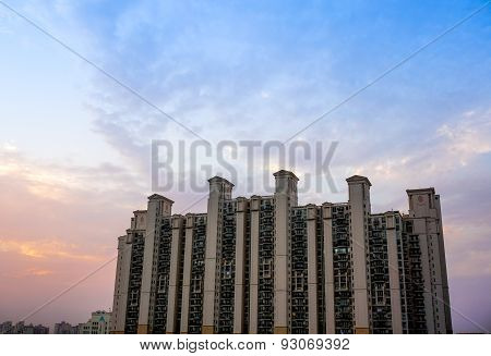 Multistoried Building In Gurgaon With Cloudy Colorful Sky