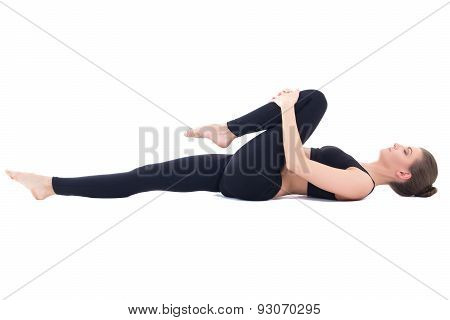 Beautiful Sporty Woman Lying And Doing Stretching Exercise Isolated On White
