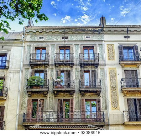 Facade of typical residential building in  Eixample district, Barcelona, Spain