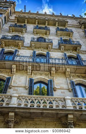 Facade of typical residential building in  Eixample district, Barcelona, Spain