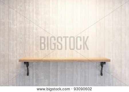 empty book shelf on wooden wall