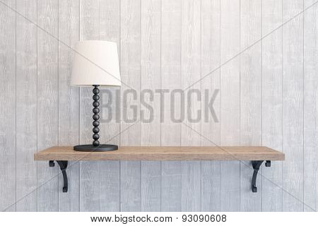  table lamp on the empty shelf