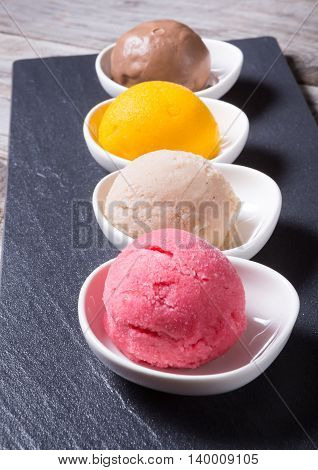 Different flavours of sorbetto balls ice cream
