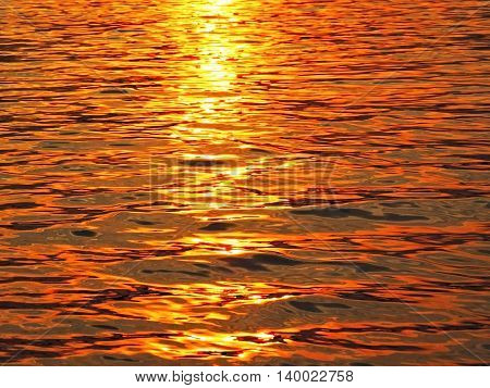 Evening sunset scene on water. Sea scene. water texture.