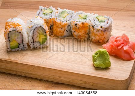 Sushi California rolls appetizer with rice avocado