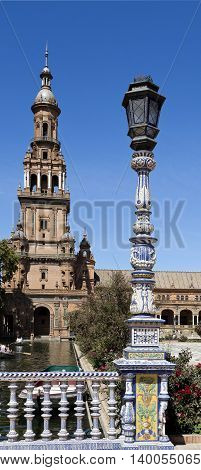 SEVILLE, SPAIN - September 13, 2015: Detail of the ceramic tiled balustrade and lamp pole at the Plaza de Espana (Spain Square) on September 13, 2015 in Seville, Spain