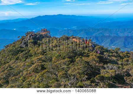 Mount Kinabalu,Ranau,Malaysia-March 13.2016:Group of climber enjoying the view top of the Ranau and Kundasang town from viewpoint Mountain Kinabalu.
