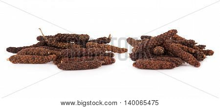 Closeup long pepper on white background. food