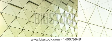 Abstract photo of modern aluminum ventilated facade of triangles