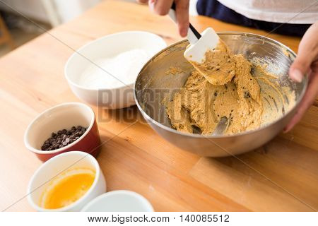 Stirring the dough for making cookies