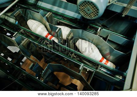 Bowling pins at bowling machine room engine