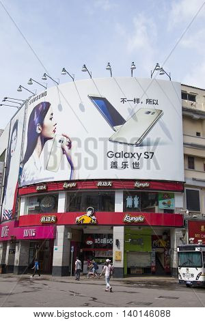 Shenzhen, China - Jun 13, 2016: Outdoor large scale advertising board of Samsung Galaxy S7 smartphone on a building in a shopping center. It's the flagship product of Samsung in 2016.