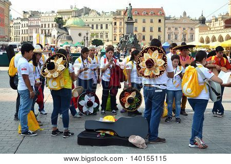 KRAKOW POLAND - JUL 27 2016: World youth day 2016.International Catholic youth Convention. Young people on Main Square in Krakow.