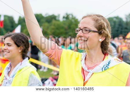 Poznan POLAND - JULY 24 2016: pilgrims praying dancing and singing during Days In Dioceses just before The World Youth Day in Krakow; WYD is a meeting of youth from all over the world