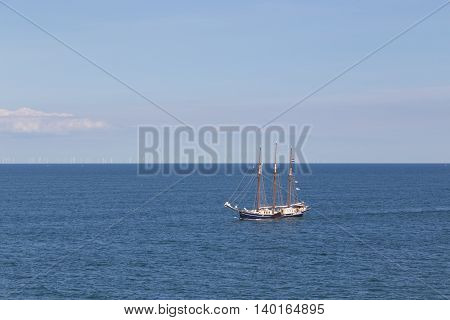 Puttgarden, Germany - July 26, 2016: A sailboat in the Baltic Sea between Puttgarden in Germany and Rodby in Denmark.
