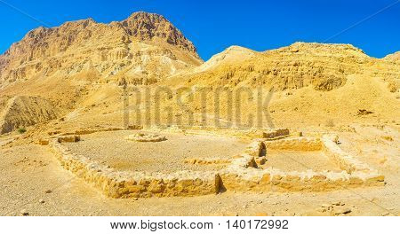 The ruins of the Chalcolithic Temple of Ein Gedi located among the desert mountains Israel.