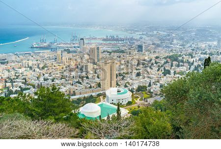The aerial view on the city of Haifa its modern districts and industrial port Israel.
