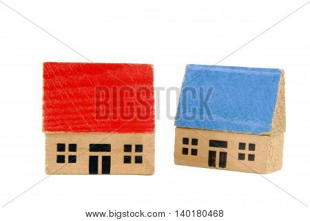 close up of the two miniature wooden houses