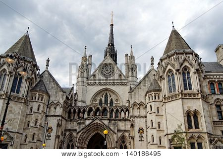 Historical building and entrance of Royal Courts of Justice in London England