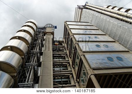LONDON UK - JULY 1 2014: The Lloyd's Building also known as The Inside-Out Building home of insurance institution Lloyd of London. Like Pompidou Centre in Paris Lloyd was designed by Rogers 1986.