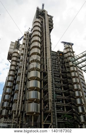 LONDON UK - JULY 1 2014: The Lloyd's Building also known as The Inside-Out Building home of insurance institution Lloyd of London. Like Pompidou Centre in Paris Lloyd was designed by Rogers 1986.